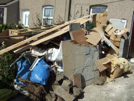 Workers sorting construction waste at a Leyton site